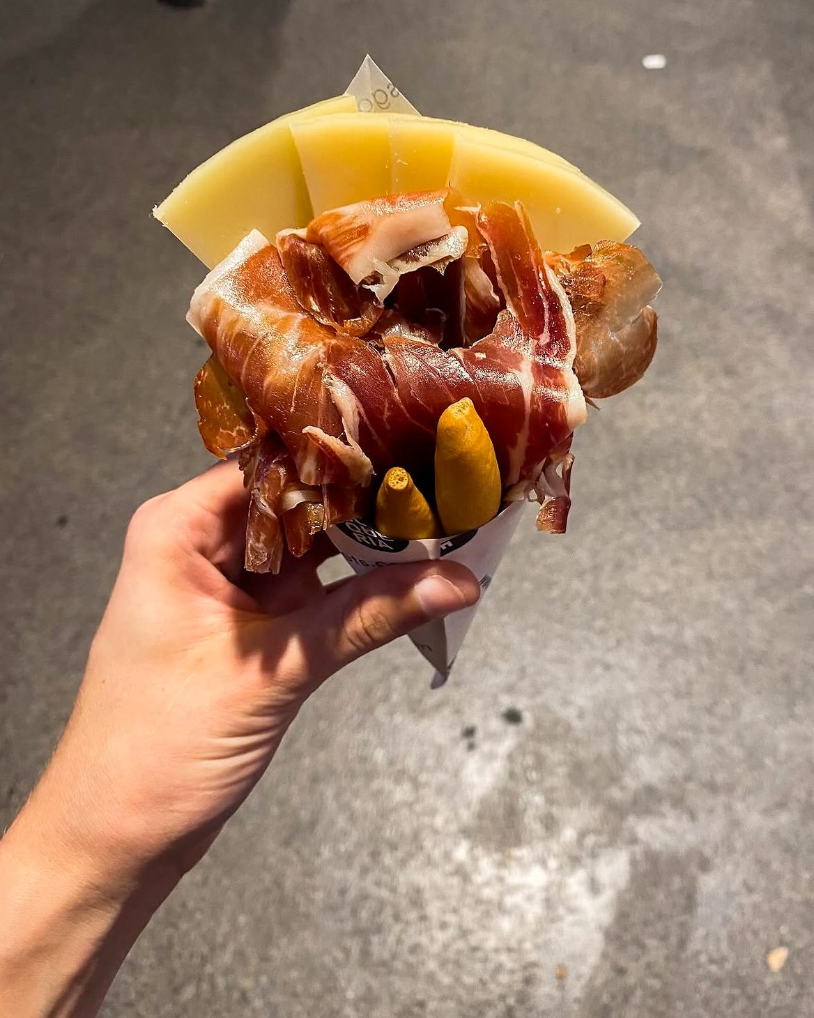 A cone of jamón and cheese from La Boqueria