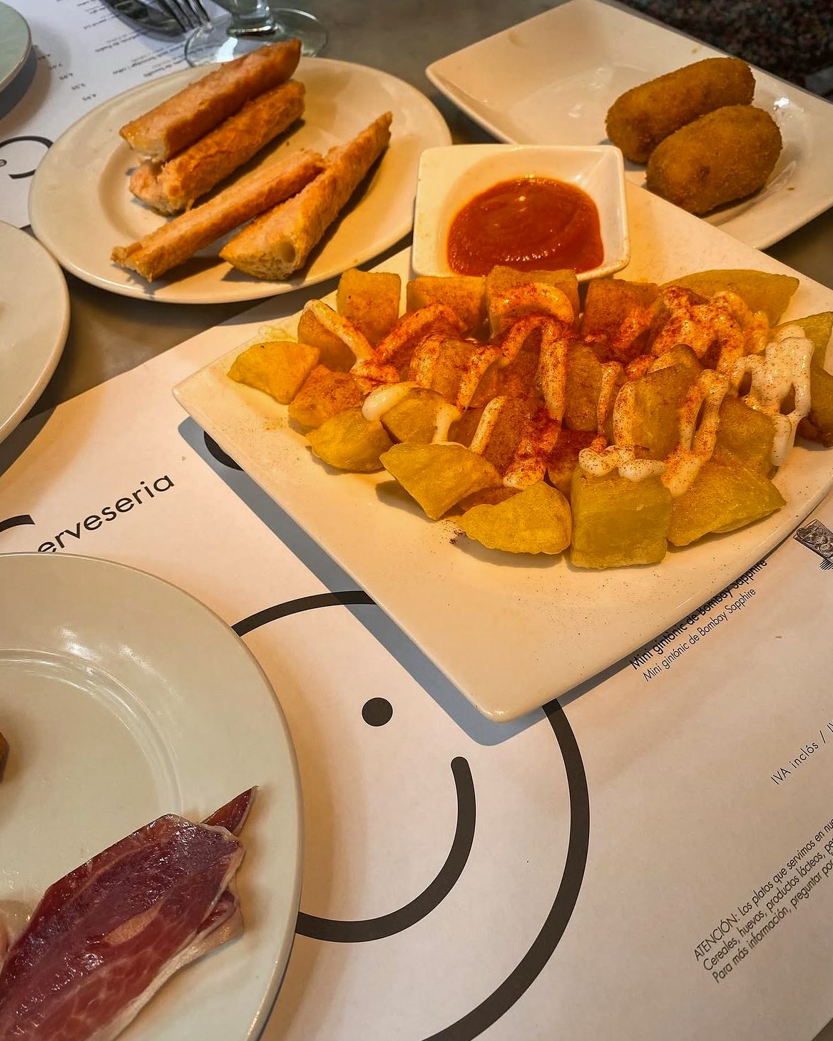 Croquettes and patatas bravas at Cervecería Catalana
