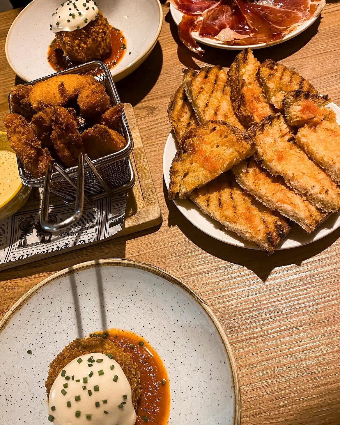 A table of tapas at Bar del Pi