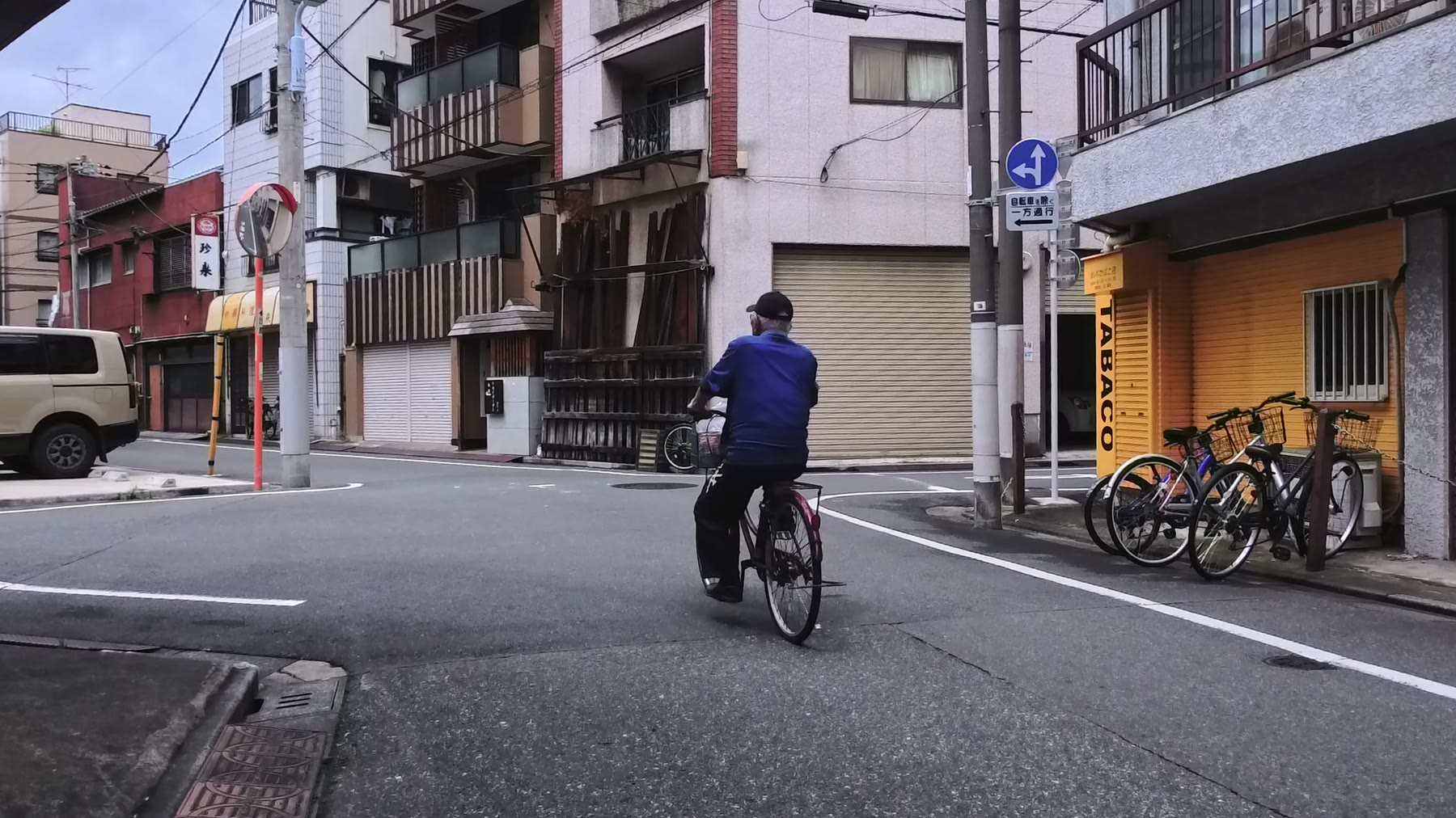 A cyclist in a side street