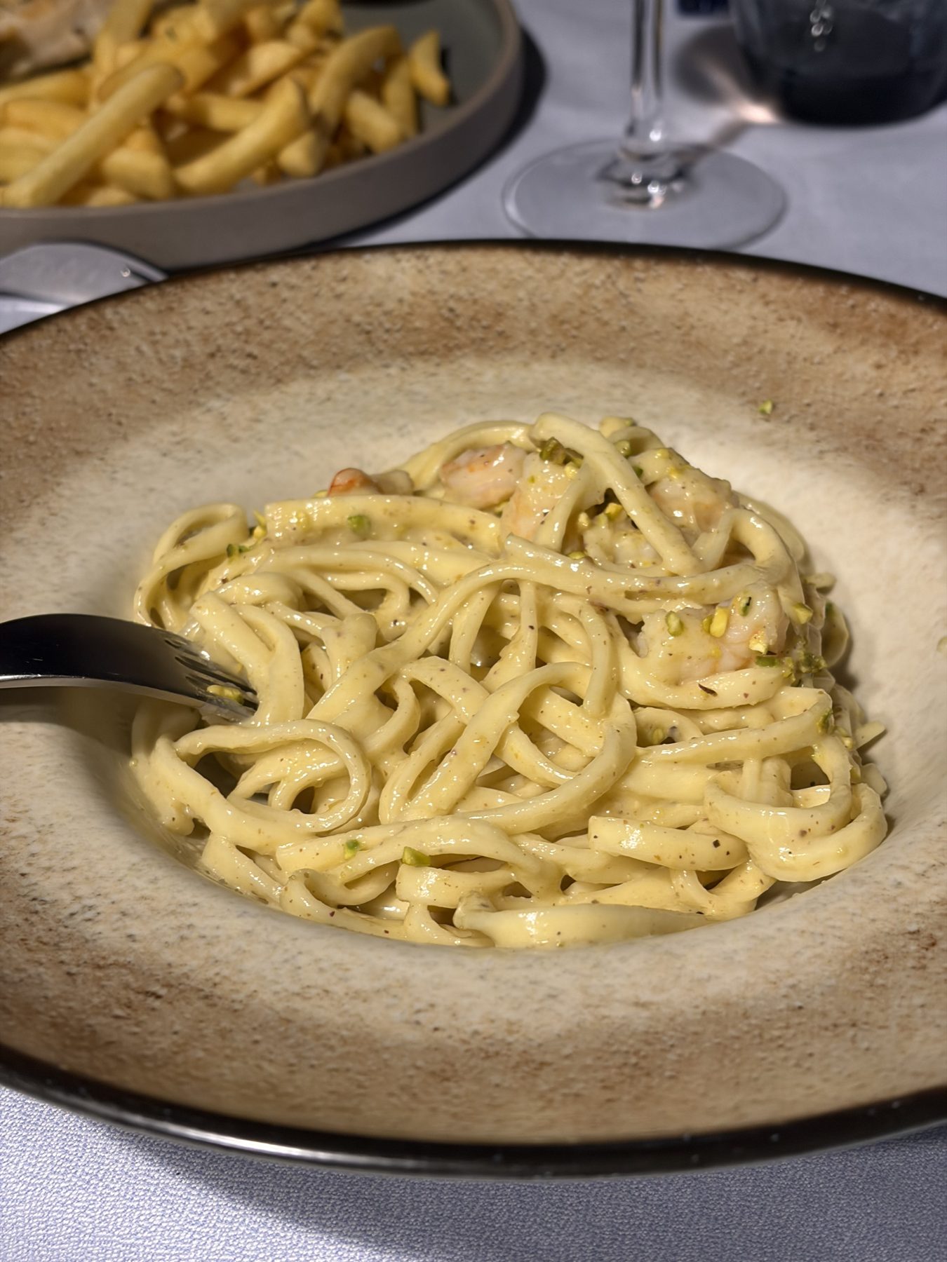 Tagliolini with pistachio cream and prawns