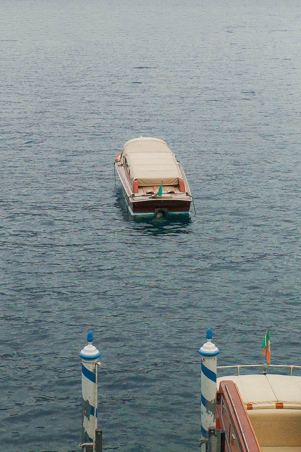 A boat in front of Varenna