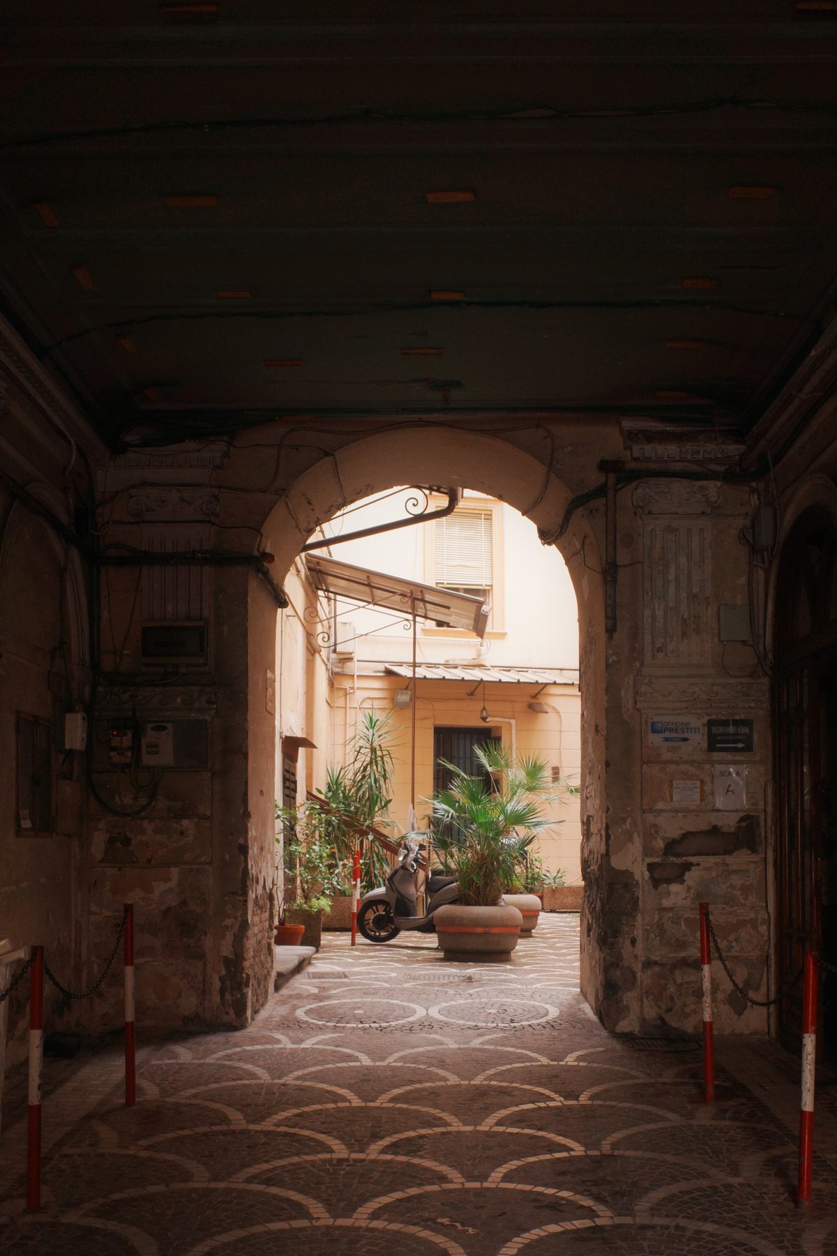 An archway into a courtyard