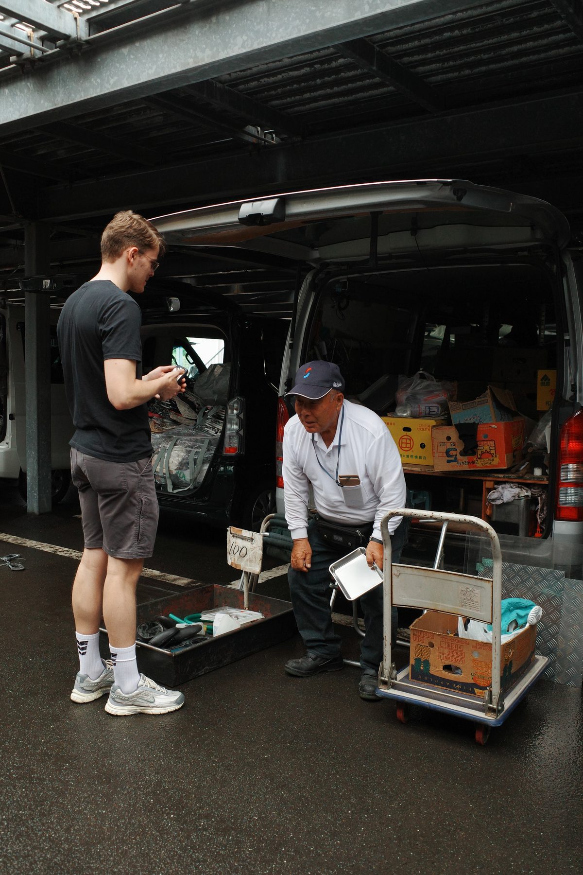 A seller at the back of his van