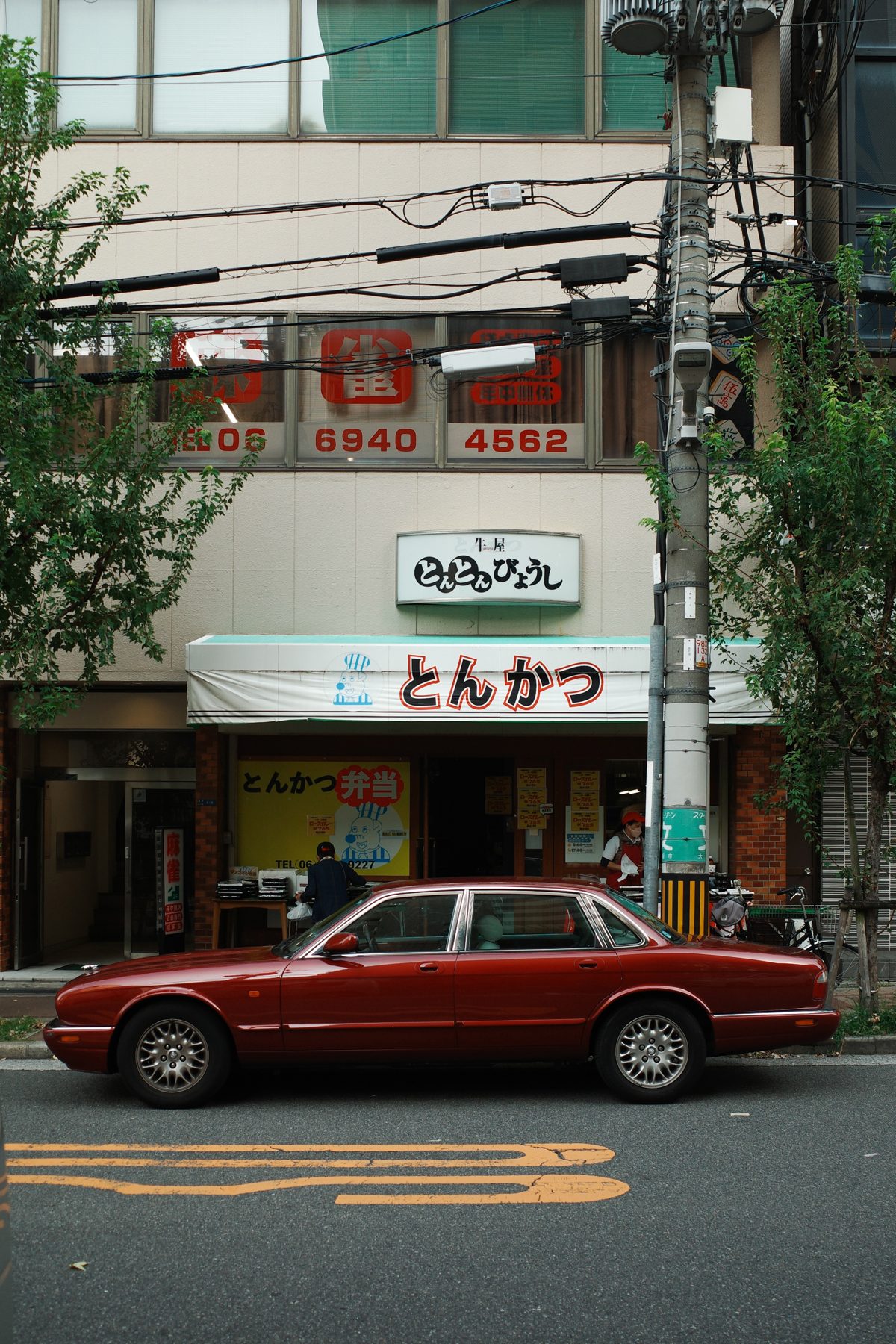 A red car in the street