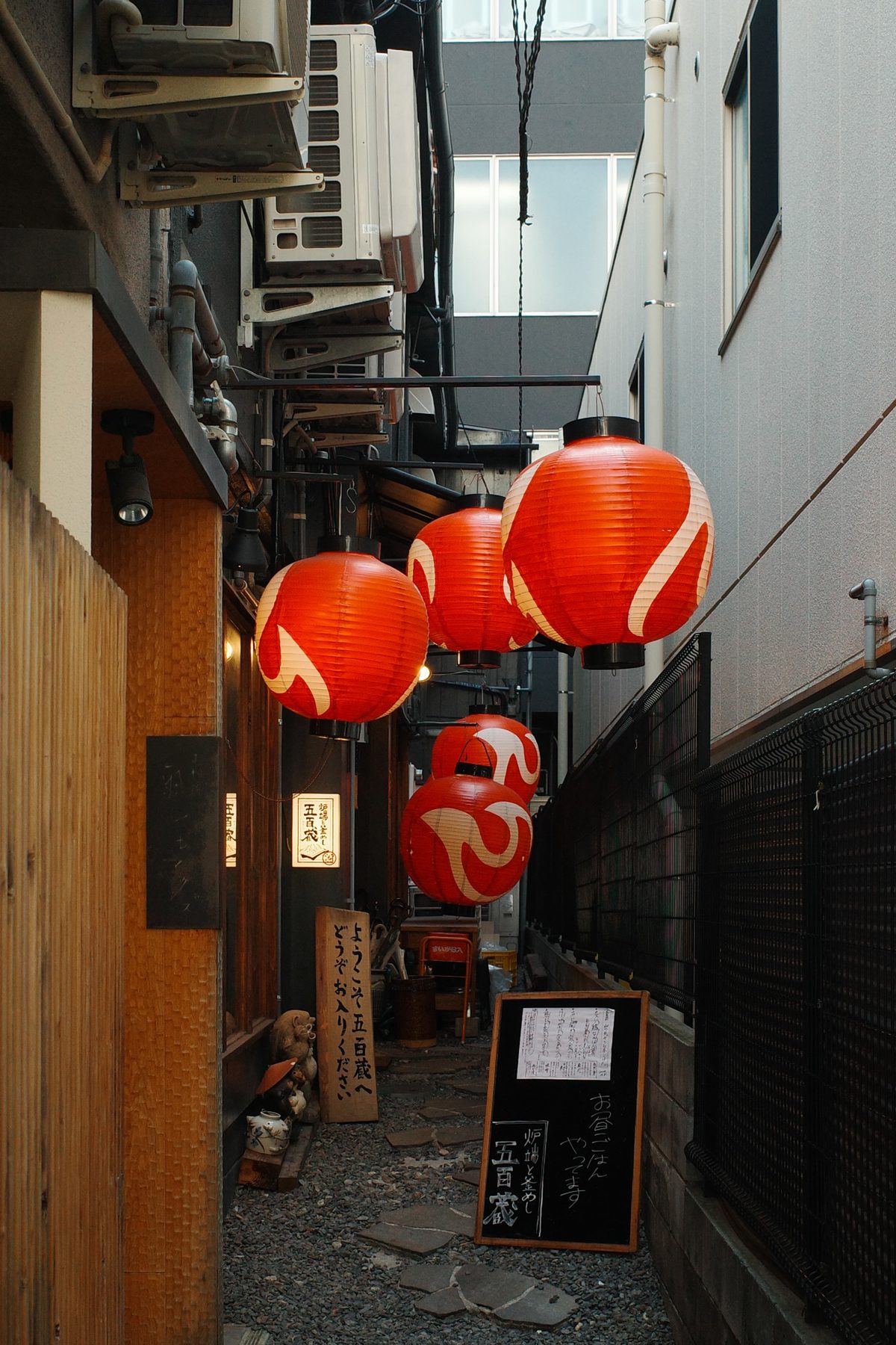 Red lanterns in an alley