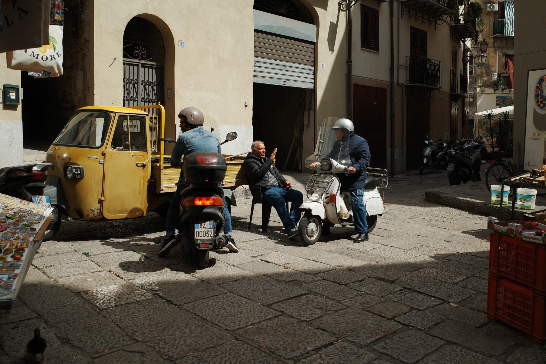 A three-wheeler in the market street