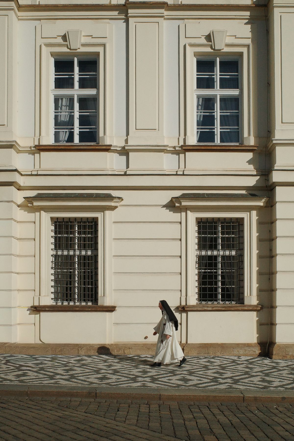 A nun in white in the castle district