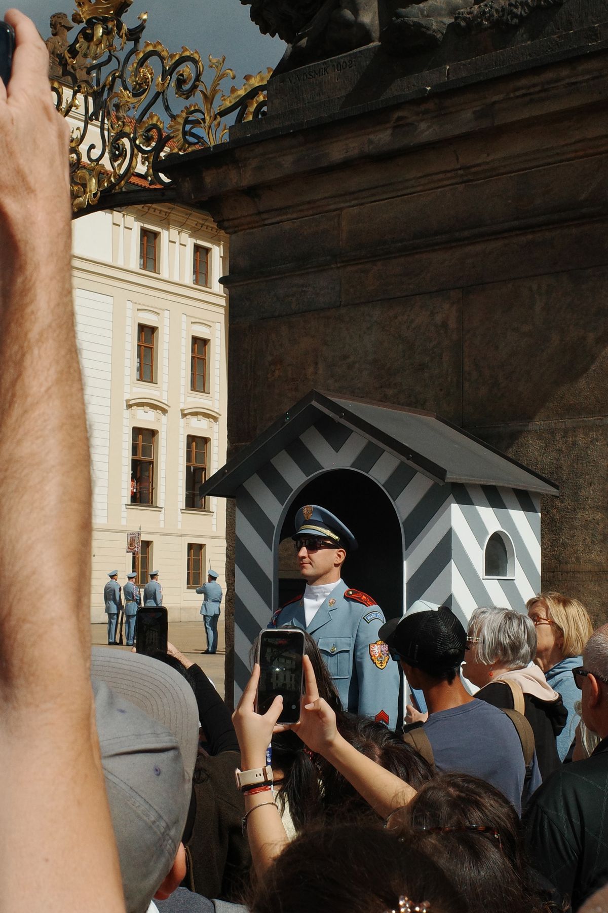 Tourists photographing a sentry box
