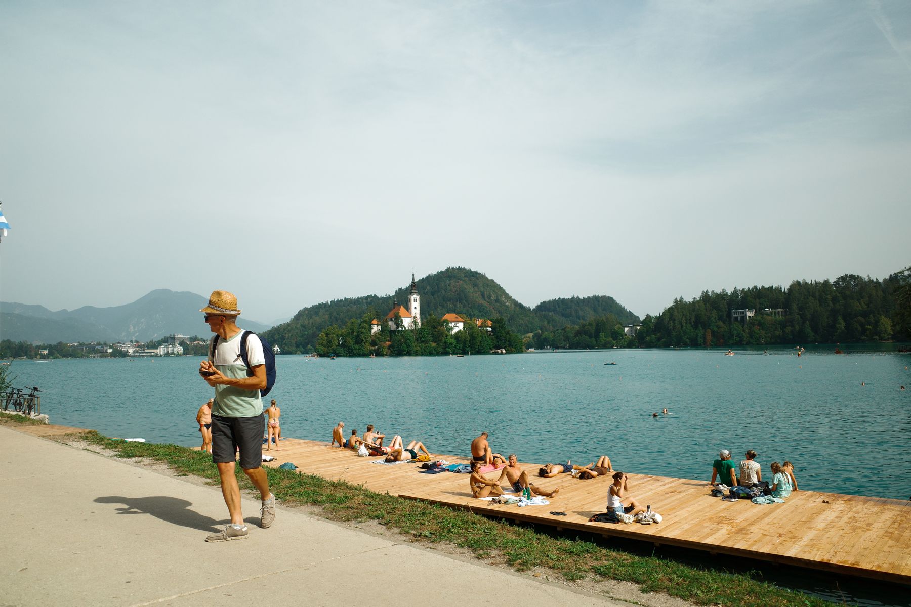 Swimmers on the wooden deck at Lake Bled