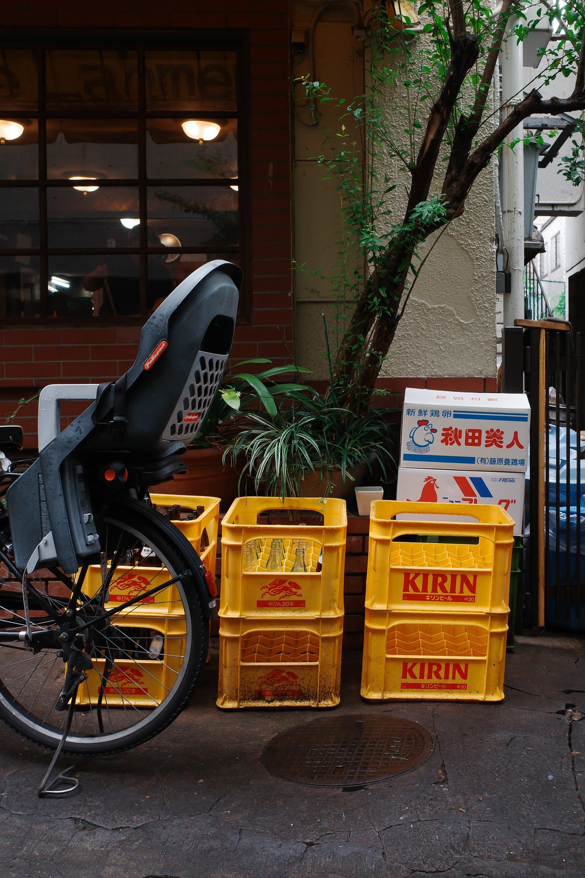 Kirin crates by a bicycle