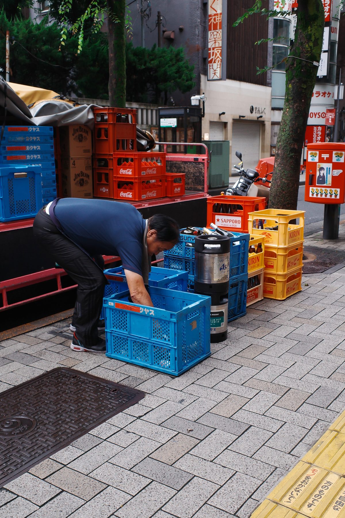 A man unloading crates