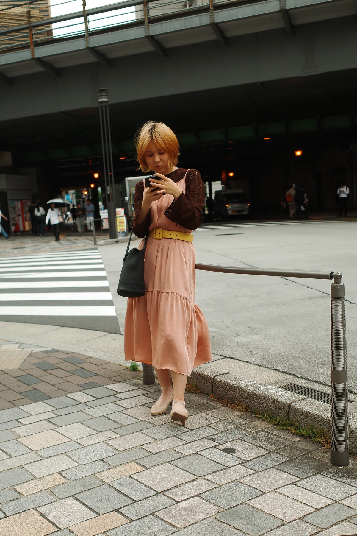 A woman in a pink skirt