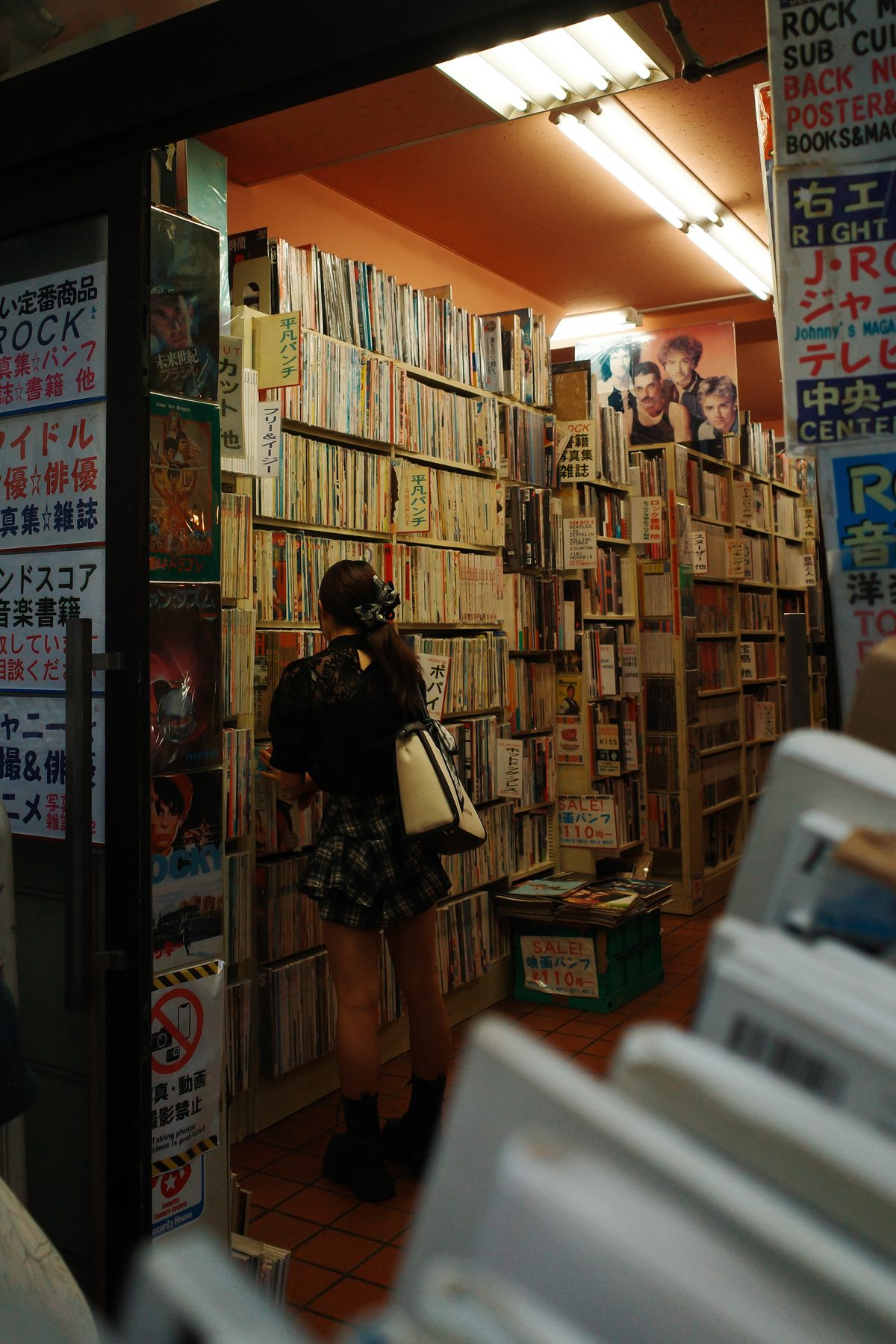A woman browsing at Yaguchi