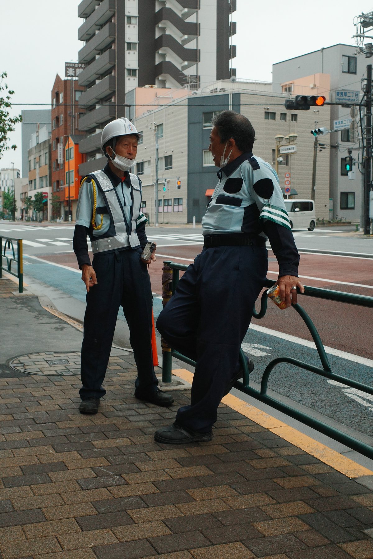 Two road workers talking