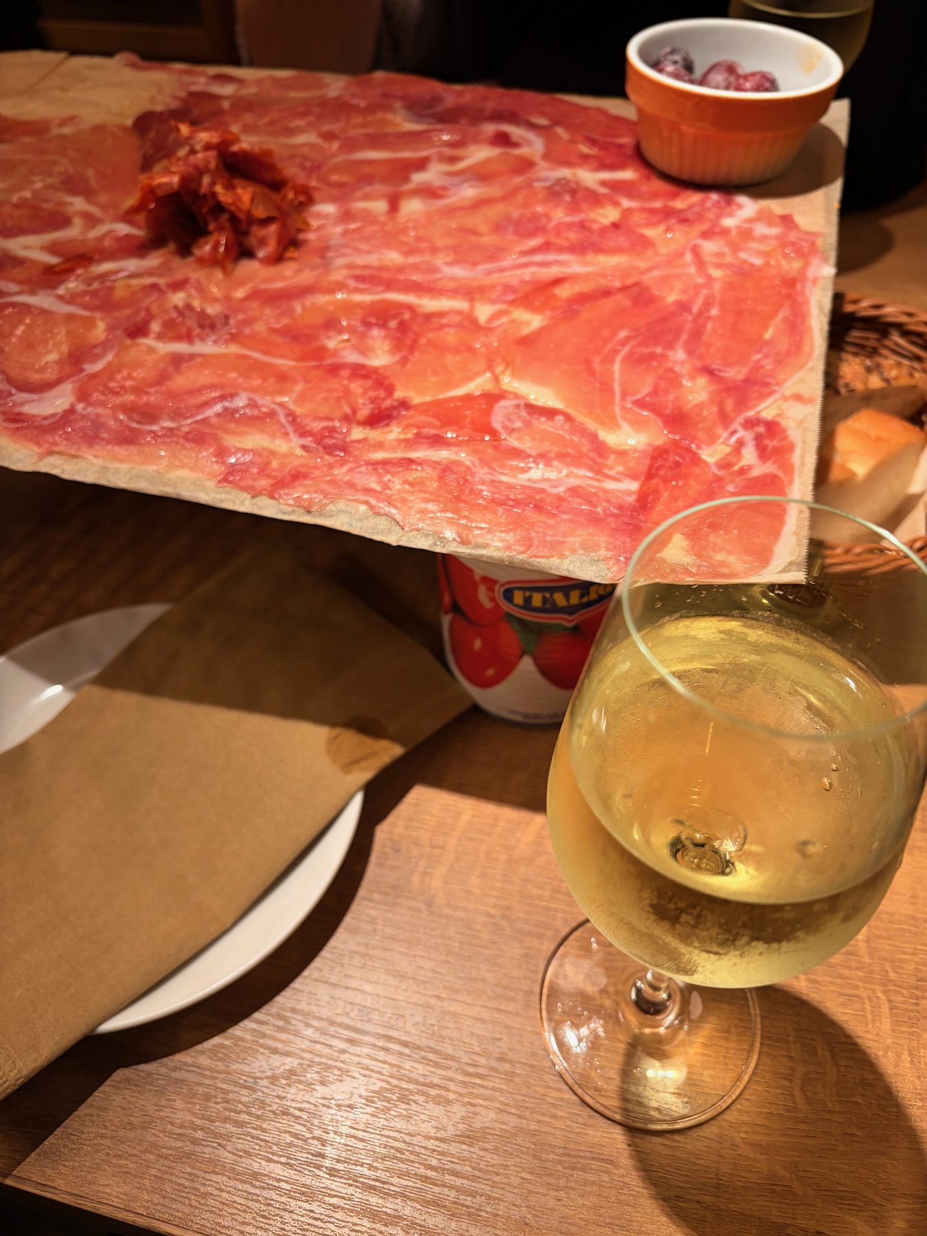 A glass of white wine at Di Punto