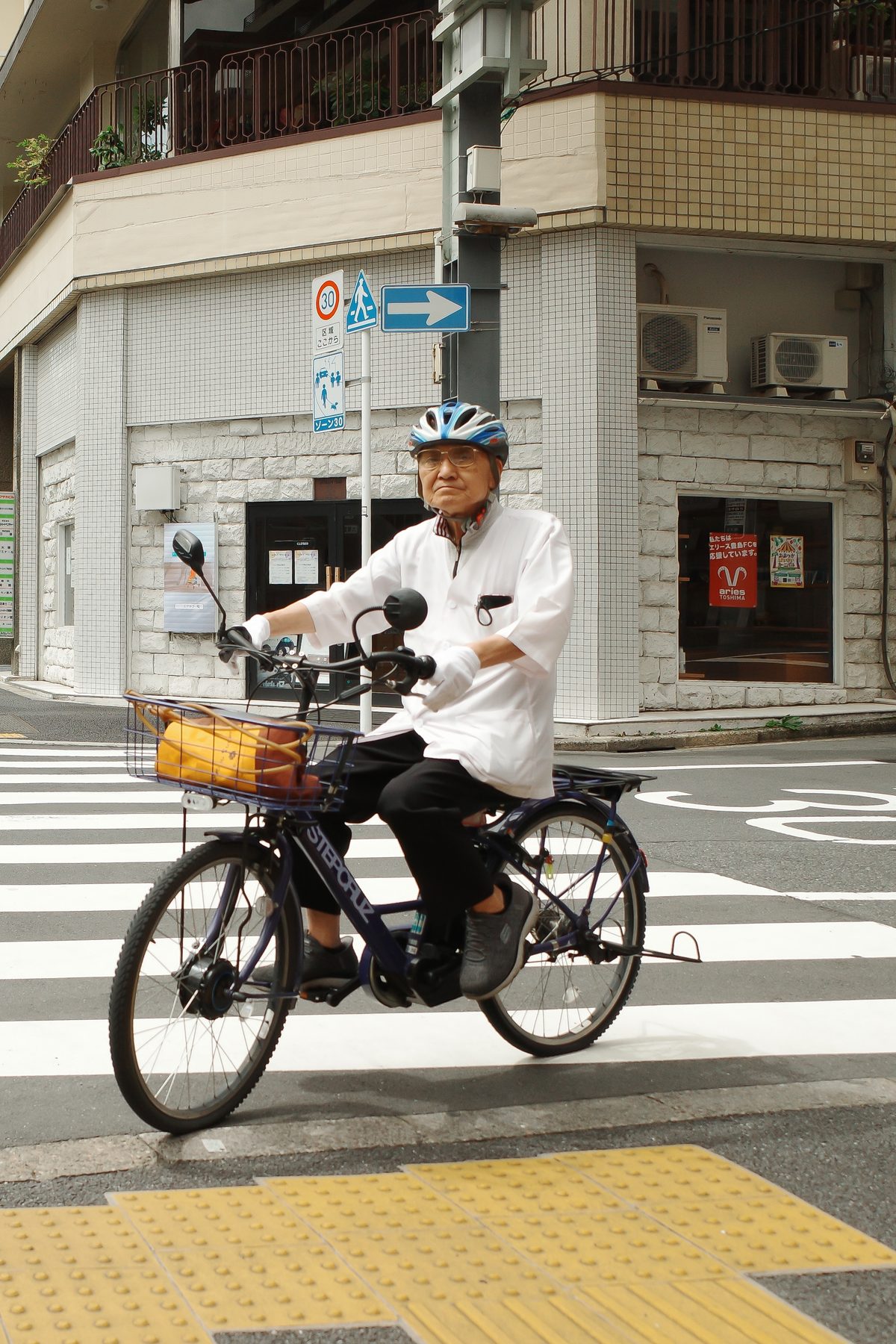 An old man on a bicycle