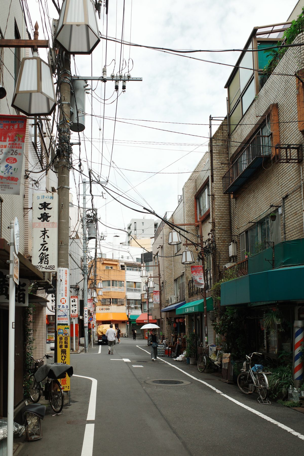 A low street with lanterns