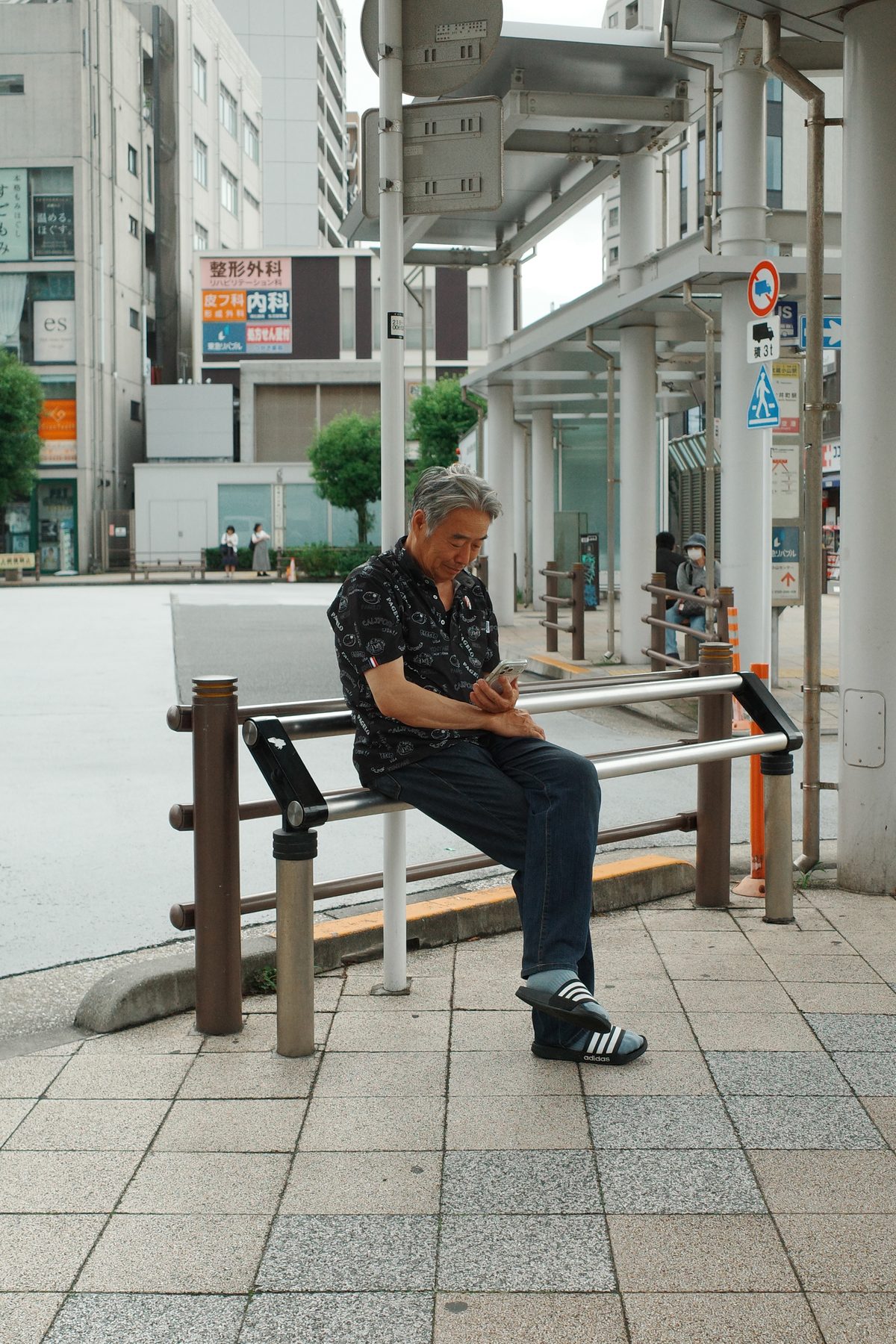 A man resting on a bench