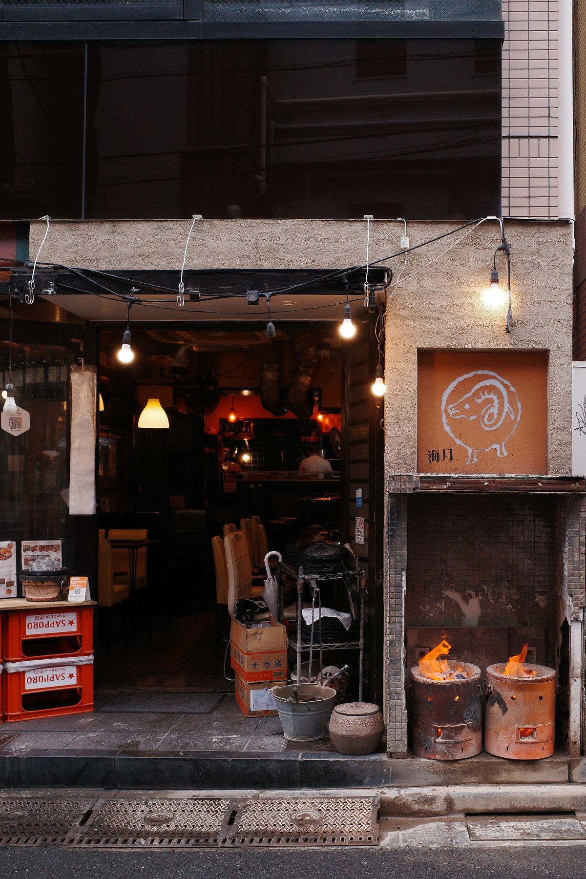 A restaurant with a fire at the door