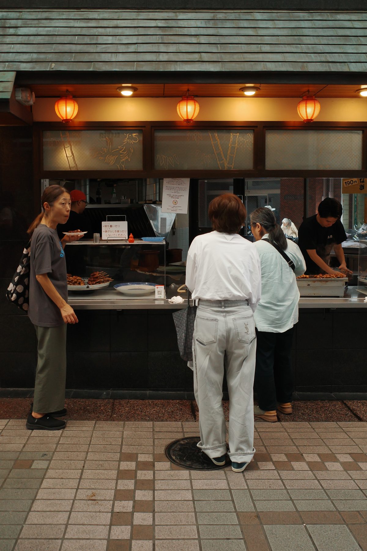 Customers at a food stall