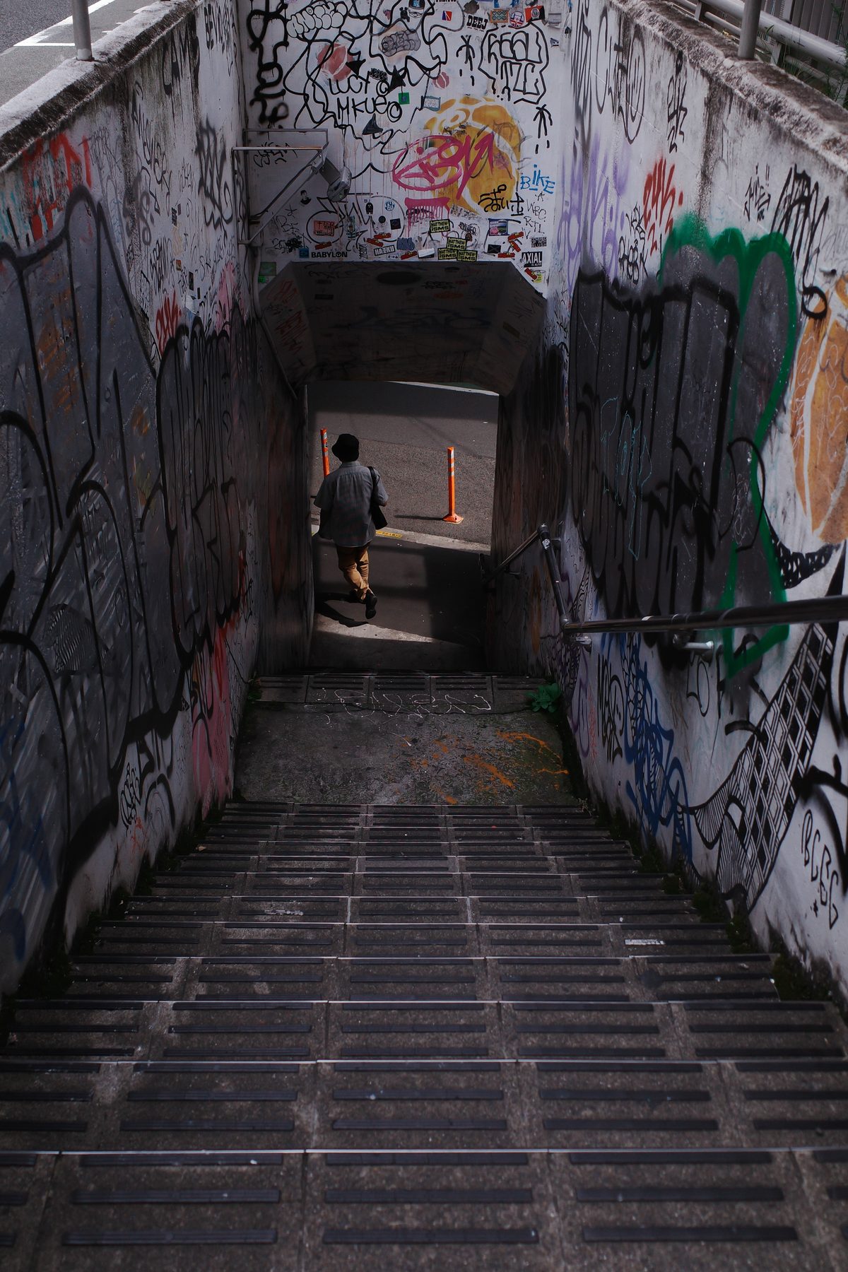 A tunnel covered in graffiti