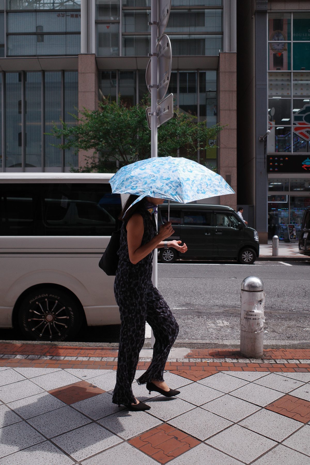 A woman with a parasol