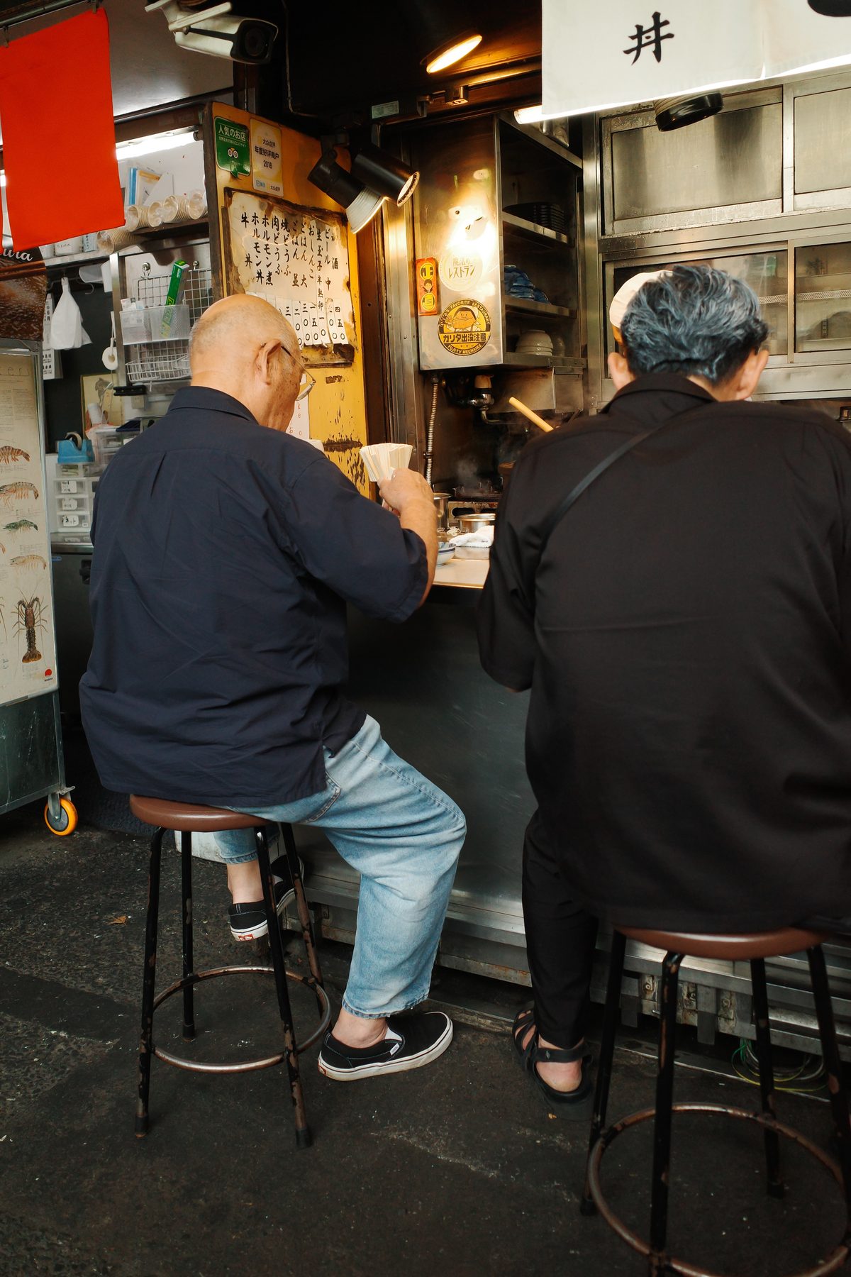 Customers at a counter in Tsukiji