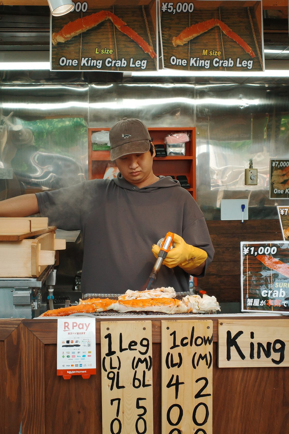 A man grilling crab at Tsukiji