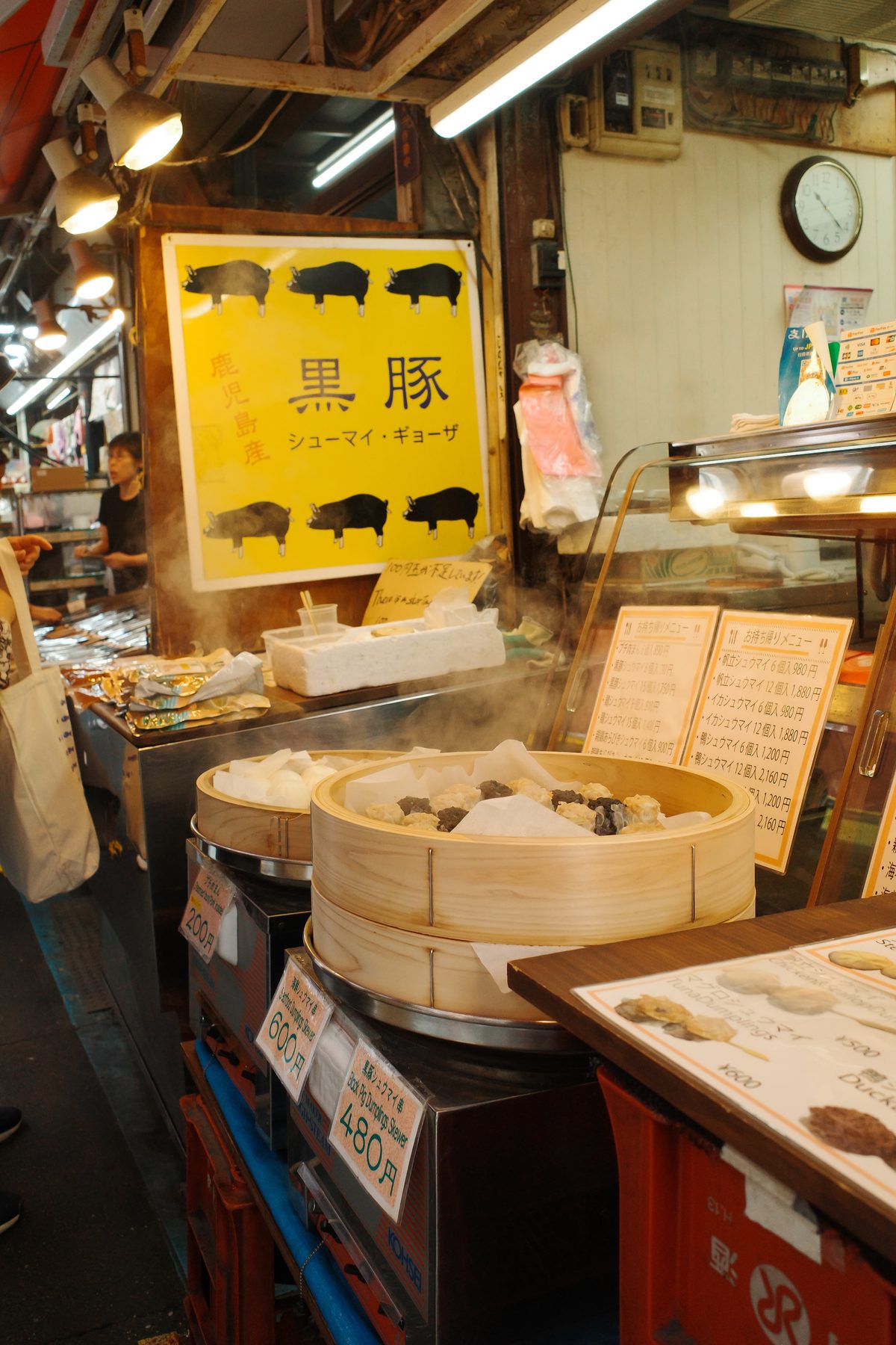 Steaming gyoza at a Tsukiji stall
