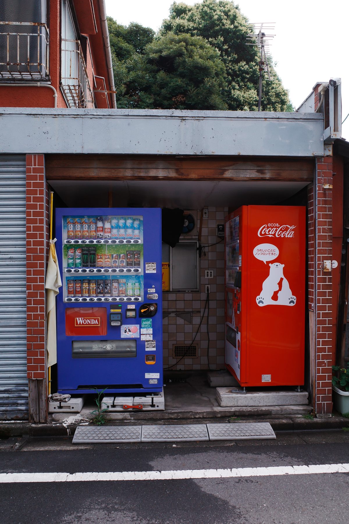 Two vending machines in a doorway