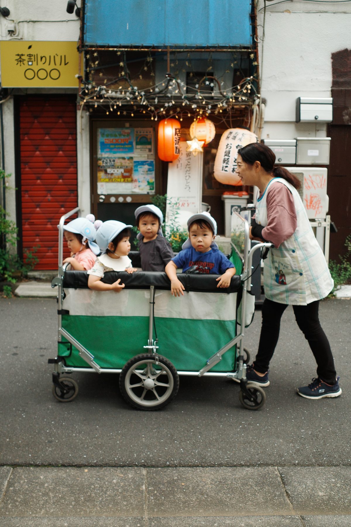 Toddlers in a nursery cart