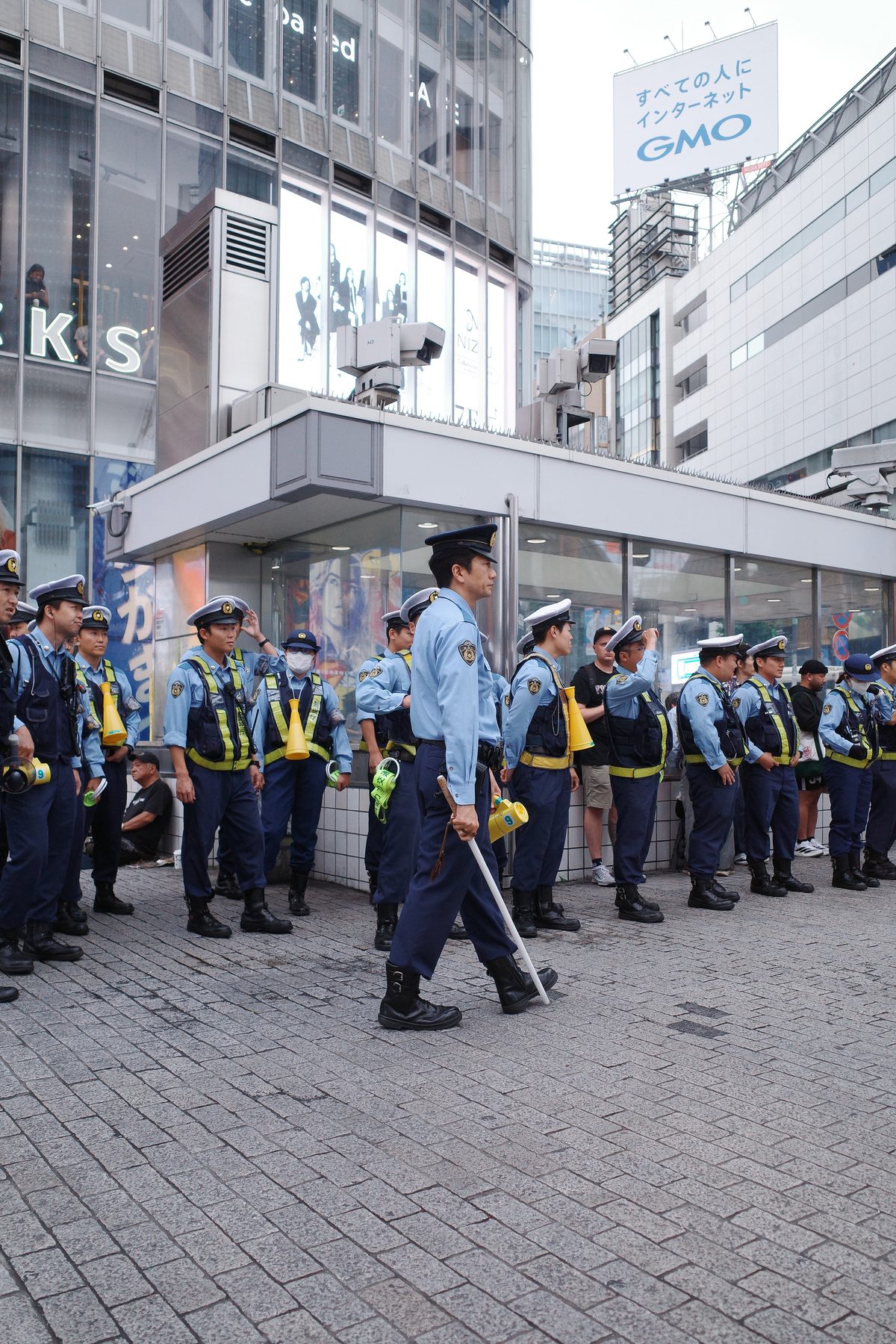 Police lined up at the Shibuya crossing