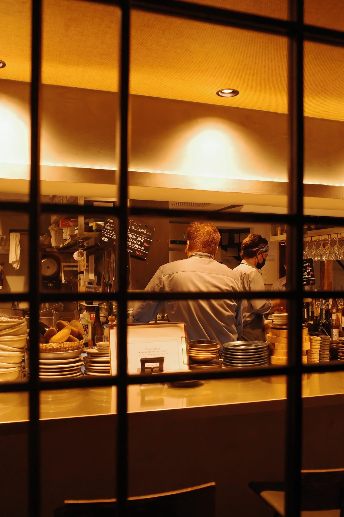 Cooks behind a window