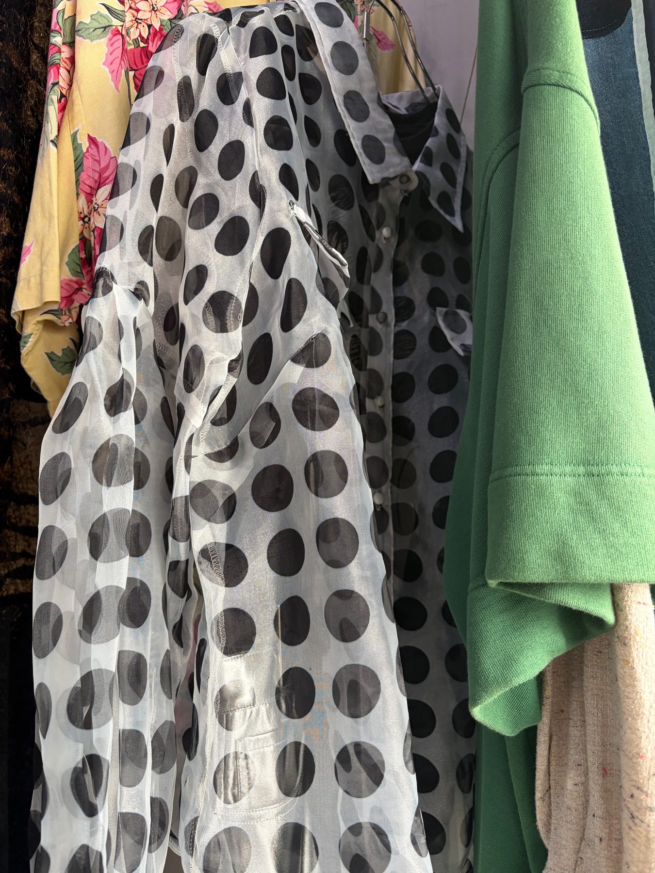 A polka dot shirt in a vintage shop